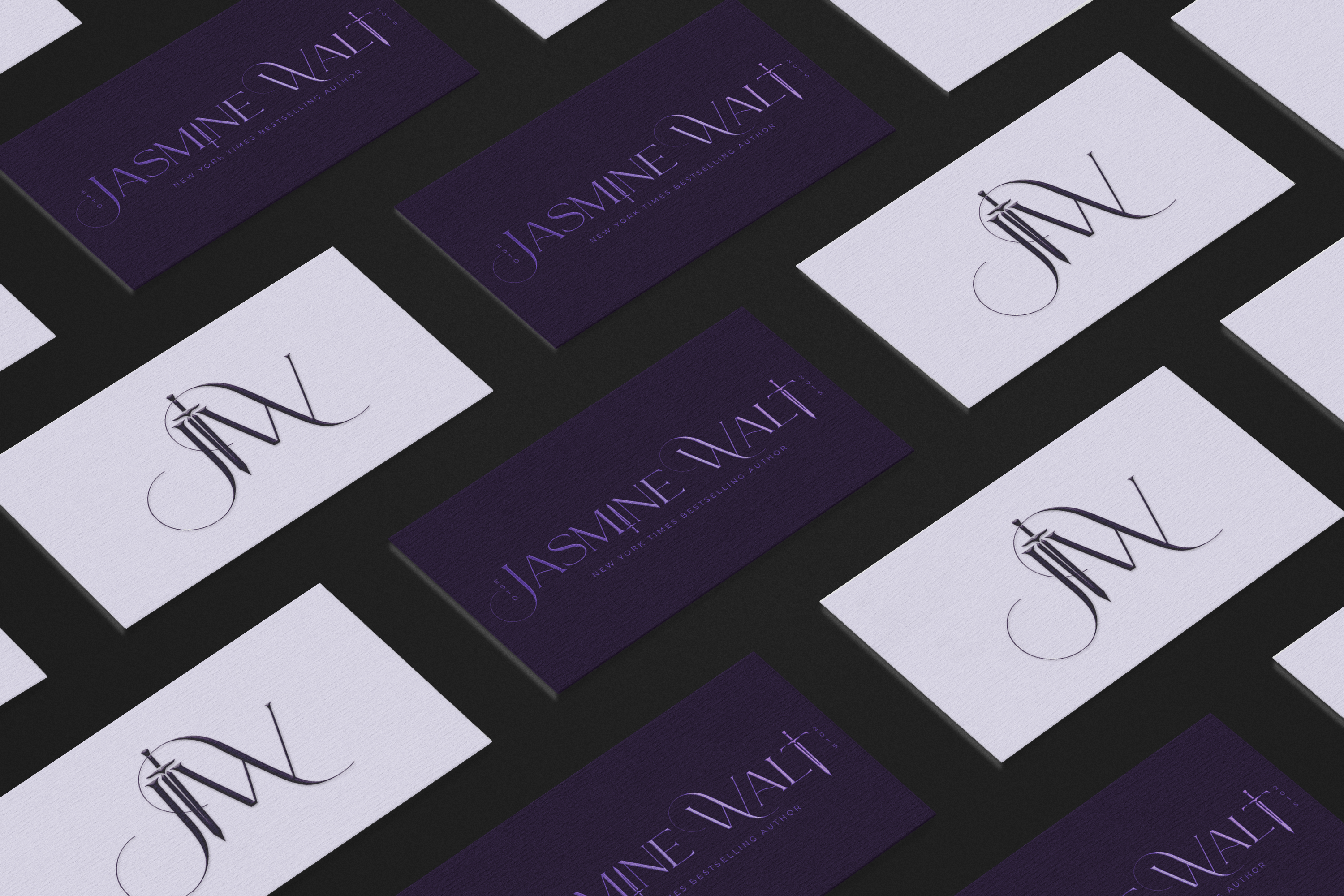 Two business cards with a logo and text on a dark background